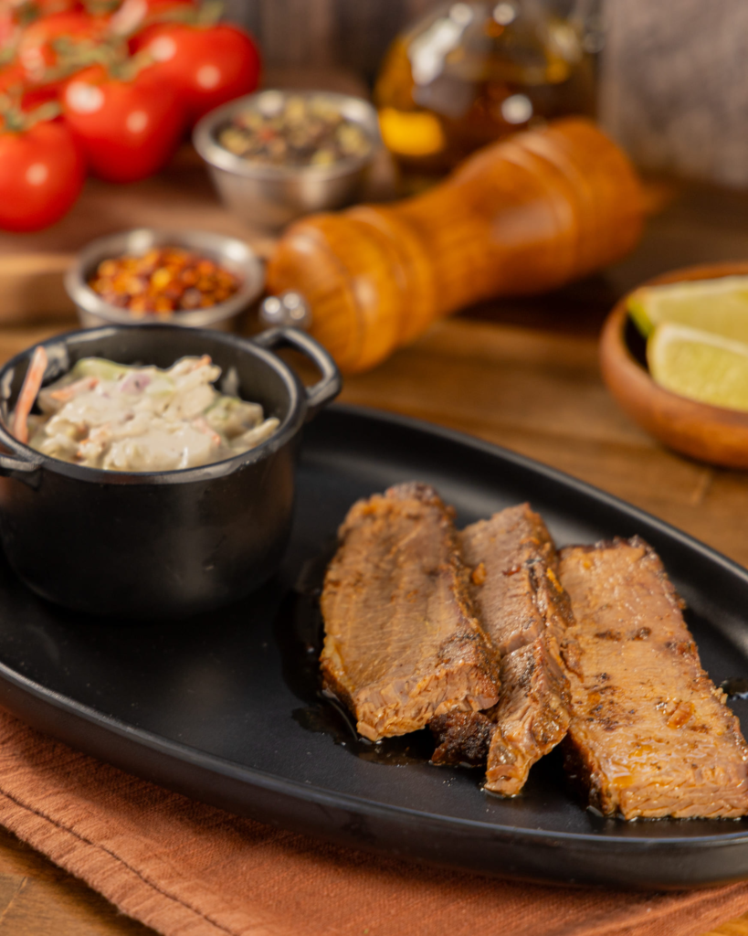 Slow-roasted beef brisket with Brazilian side dishes