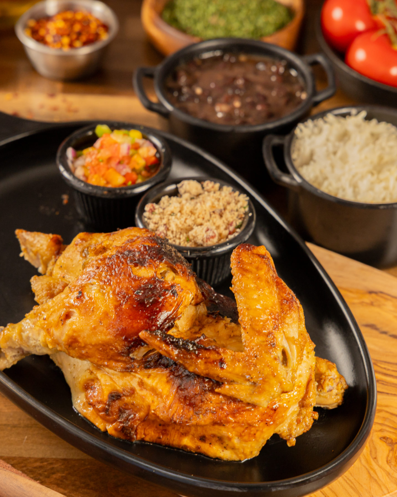 Half roast chicken seasoned with herbs and spices