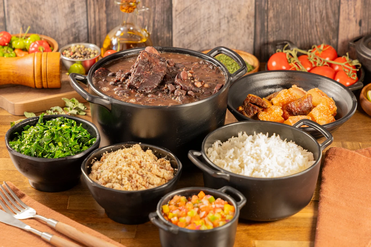 Feijoada Completa in Lake Nona — Brazilian black bean stew with smoked pork and beef, served with rice, collard greens and farofa