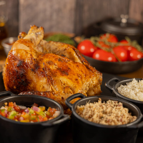Whole roast chicken served at Kingdom BBQ & Grill in Orlando